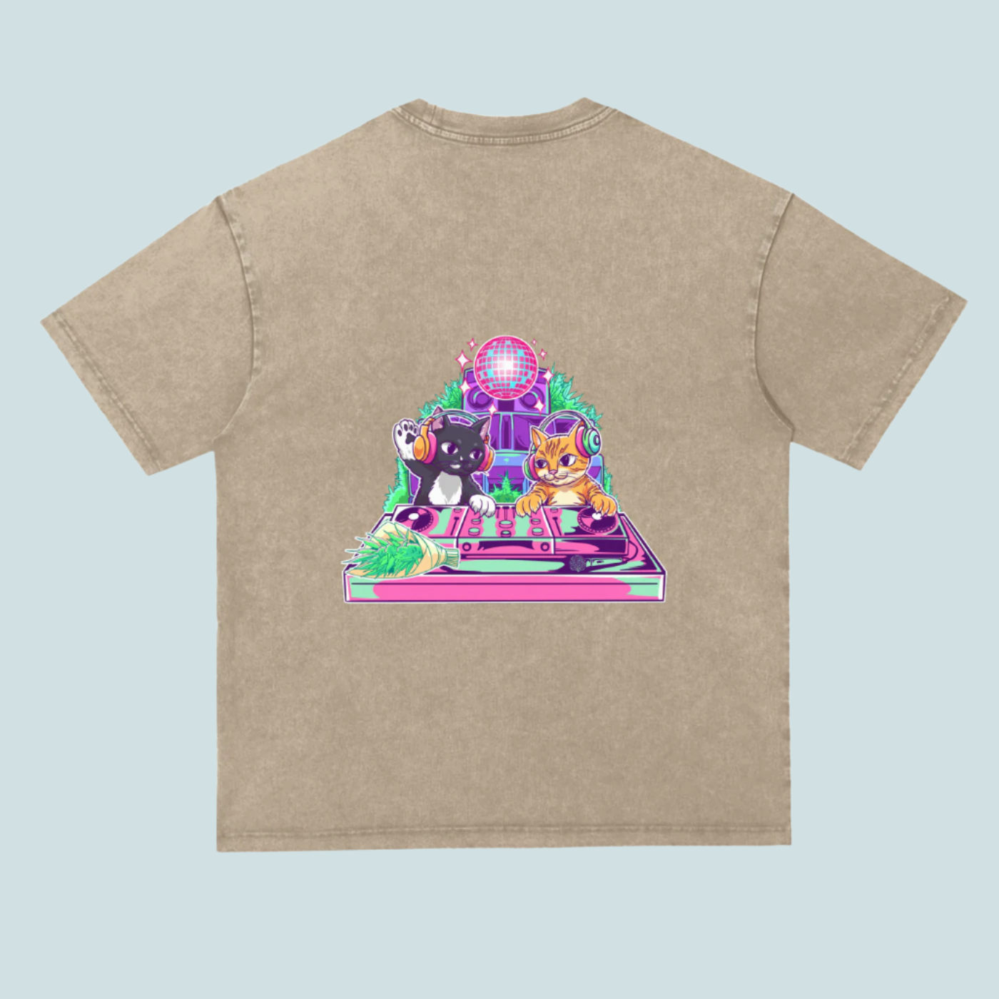 Beige t-shirt with a colorful graphic of cats on a turntable and disco ball.