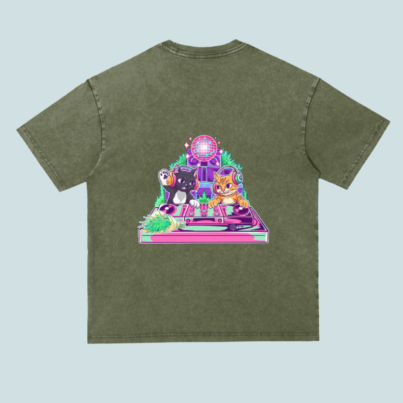 Green t-shirt with a colorful graphic of cats on a turntable and disco ball on a white background